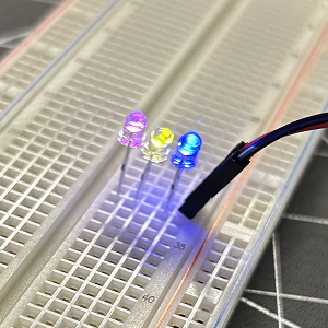 Expanding off teh first exercise, I added more lights on the breadboard. The brightness decresed as each light was added and some colours shone brighter than others.